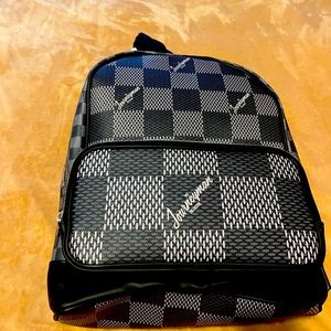 The JOURNEYMAN COLLECTION New purse/backpack